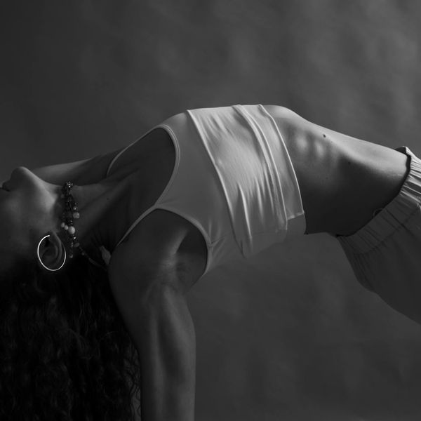 Person finding balance in a calm, focused pose.